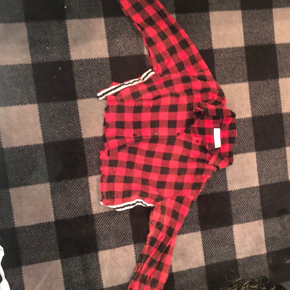 A red and black plaid button down flannel - Picture 1 of 4